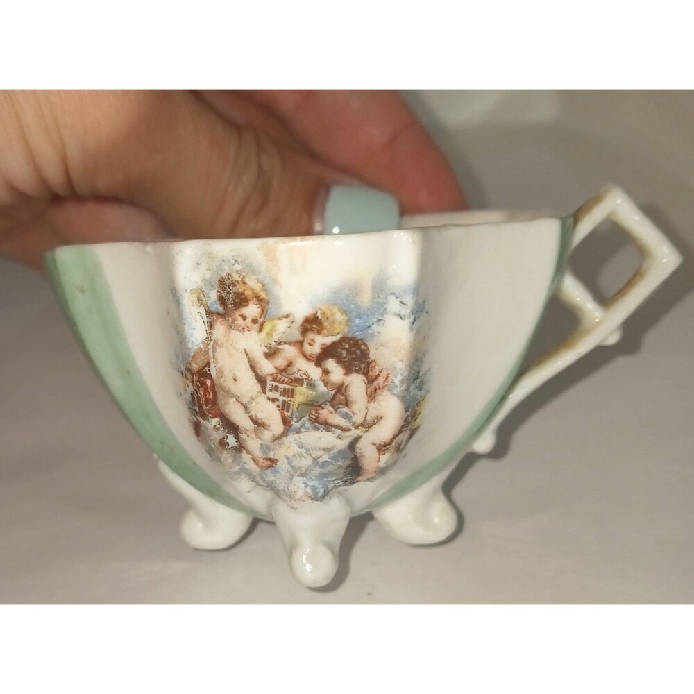 Three-Footed Demitasse Porcelain Teacup and Saucer Cherubs Unmarked Teaparty